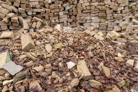 Pieces of concrete and brick rubble debris on construction site