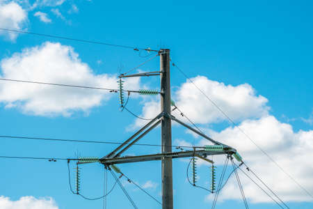 High voltage electricity transmission pylon on the sky backgroundの写真素材