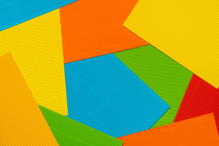Striped colored embossed paper. Colorful paper background.