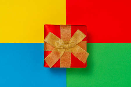 Luxury gift box on colored paper background. Holiday concept.の写真素材