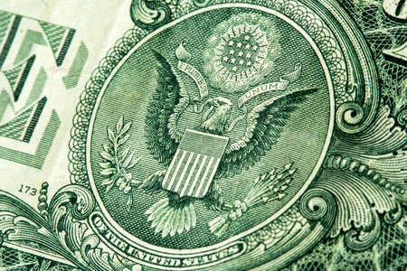 Fragment of a US dollar bill. Symbols of the United States.の写真素材