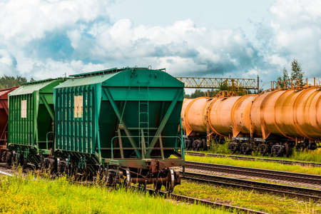 Grain carrier freight car for transportation of bulk cargo of grain crops, railway track with...