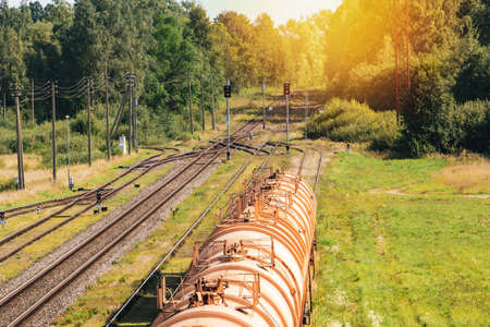 The freight train passing through a railway yard