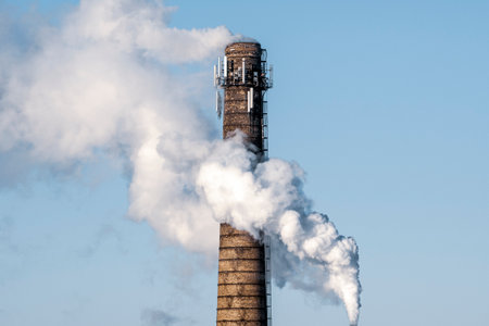 A large industrial pipe produces gas into the atmosphere. Bad ecology, harmful emissions into the atmosphere.の写真素材