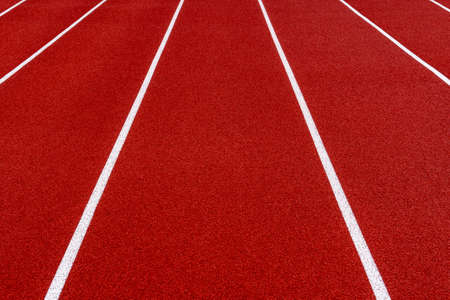 Empty treadmill in red. Background image to insert text.の写真素材