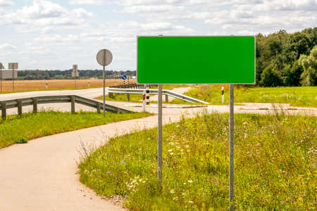 Blank  green billboard or road sign on the highway. Copy space.の写真素材