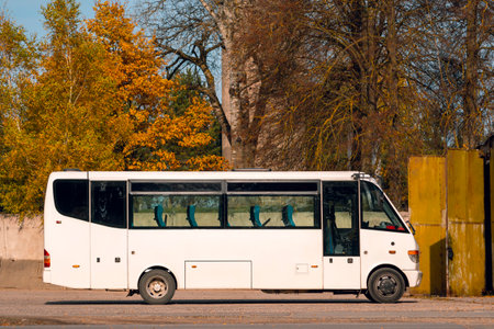 Travel, tourism, road trip and passenger transport - empty tour bus parked outdoorsの写真素材