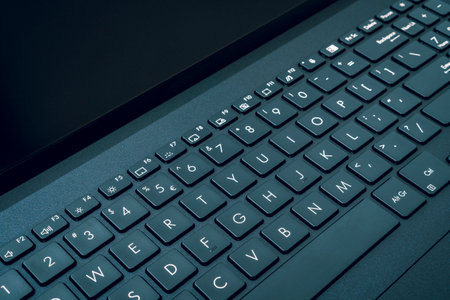 Close up of keyboard of a modern laptop.