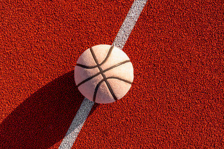A well worn basketball ball on the sports field.Basketball on urban court. Healthy lifestyle and sport concepts.の写真素材