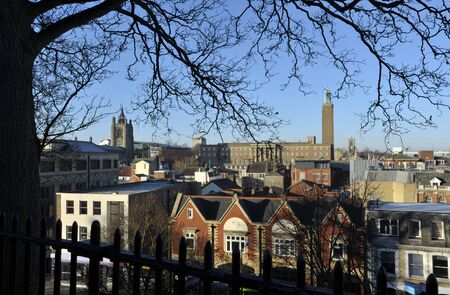 The city of Norwich, Norfolk, UK, view from Norwich Castle with a skyline which includes City Hall and the church of St Peter Mancroft.のeditorial素材