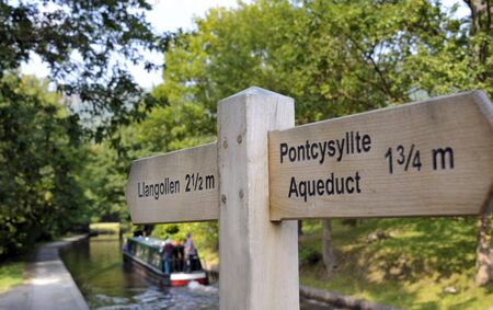 Narrow boat navigating the Llangollen canal.の写真素材