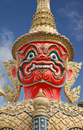 Mythical figure standing guard at the Grand Palace, wat phra kaeo, Bangkok, Thailand.のeditorial素材
