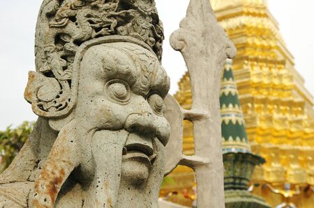 Stone figure at the Grand Palace, Bangkok, Thailand.のeditorial素材