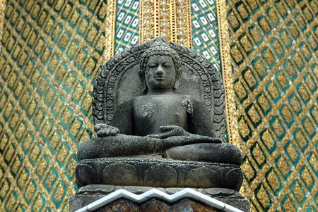 Seated buddha sculpture, Grand Palace, Bangkok, Thailand.のeditorial素材