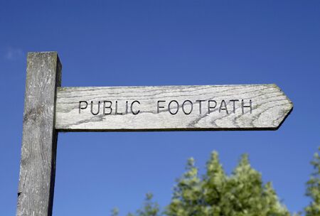 Wooden Public Footpath sign in the countryside.の写真素材