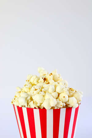 Popcorn in a bag on white backgroundの写真素材