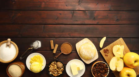 Apple strudel ingredients on a wooden tableの写真素材