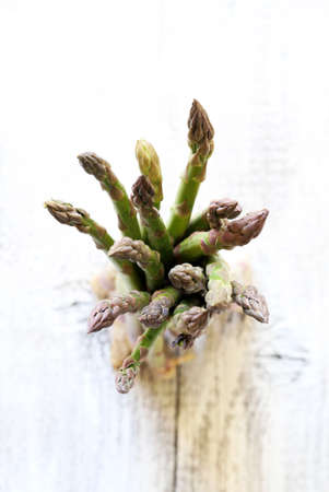 Top view of fresh bunches asparagus on a light background. Healthy food concept.の写真素材