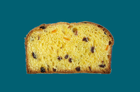 Christmas holiday. A slice of traditional Italian Christmas Panettone cake with dried fruits.