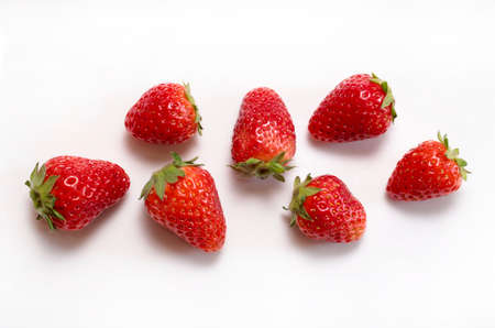 Fresh strawberries isolated on a whiteの写真素材
