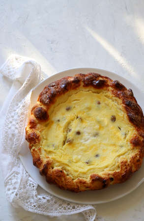 Traditional Romanian Easter cake with cheese - Pasca, white background. Directly above.の写真素材