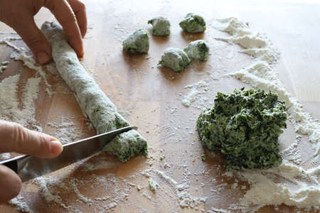 Fresh homemade gnocchi with spinach. Directly above.の写真素材