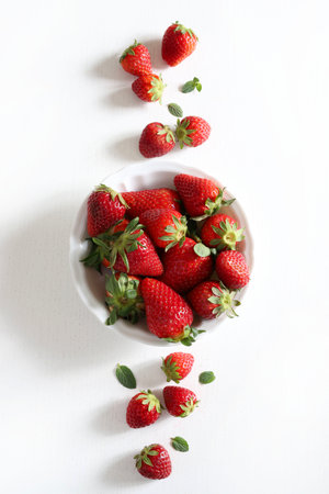 Fresh strawberries isolated on white background. Perfect for canvas, background, web page. Overhead view. Copy space.の写真素材