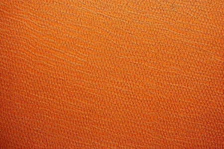 Orange leather texture close up. Abstract background and texture for design.の素材