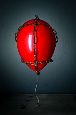 Balon floats on a chainの写真素材
