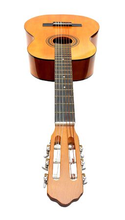 Classical acoustic guitar isolated over a white backgroundの写真素材