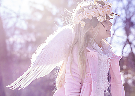 Beautiful angel girl outsideの写真素材