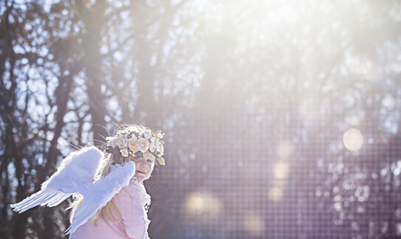 Beautiful angel girl outsideの写真素材