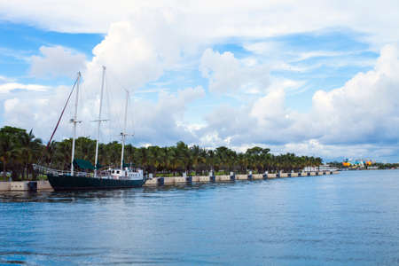 Beautiful yacht at port during summer vacationの写真素材