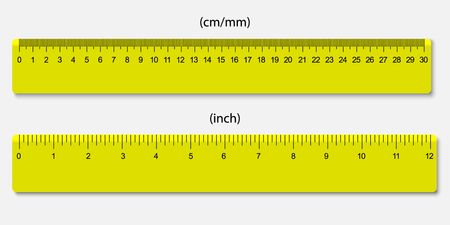 Yellow rulers, marked in centimeters and inchesのイラスト素材