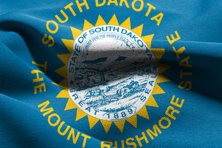 3D illustration flag of South Dakota is a state of United States. Waving on the wind flag textile backgroundの写真素材