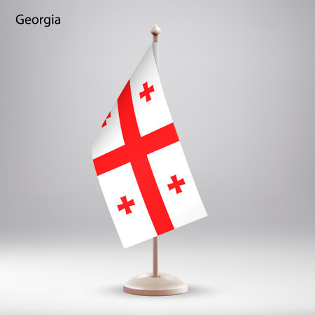 Flag of Georgia hanging on a flag stand. Usable for summit or conference presentaitonのイラスト素材