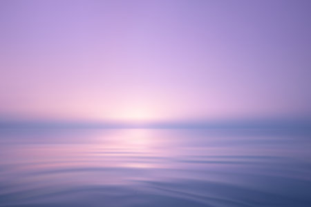 Minimal seascape with pastel glow, smooth reflections, and gentle wavesのイラスト素材