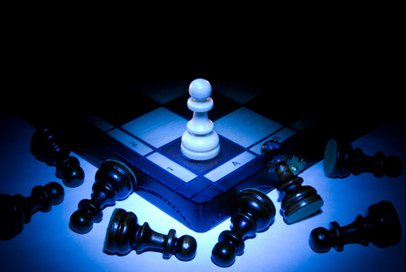 Chess board and pawns  A dark blue art background の写真素材