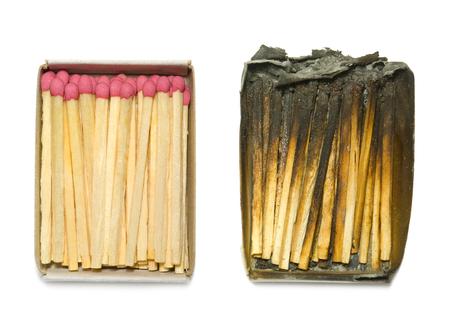 Matches in a paper box  burned down and the whole   An isolated white background の写真素材
