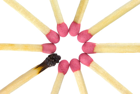 Red matches on a white isolated background One match burned down の写真素材