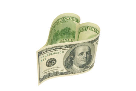 Dollars in the form of heart  on a white background  の写真素材