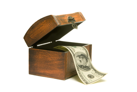 Hundred dollars and wooden chest. Isolated over white.の写真素材