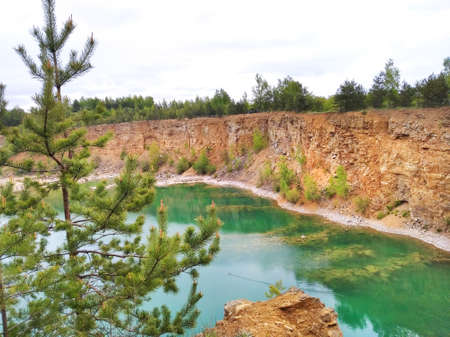 Rocky cliff above the reservoir Wydra