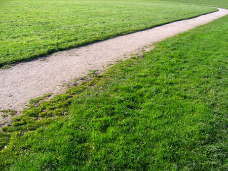 Path Across Village Green in Cheshire Village of Aldfordの写真素材