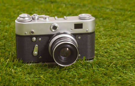 Old camera on the grassの写真素材