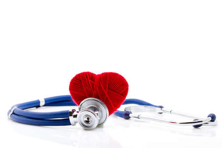 Stethoscope and heart on a white backgroundの写真素材