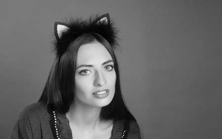 Beautiful and healthy girl model with long hair. Black and white photography. Bezel with earsの写真素材