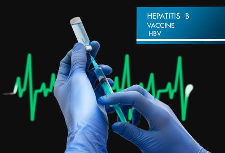 Stop Hepatitis B (HBV). Vaccine to treat disease. Syringe and vaccine with drugs.の写真素材