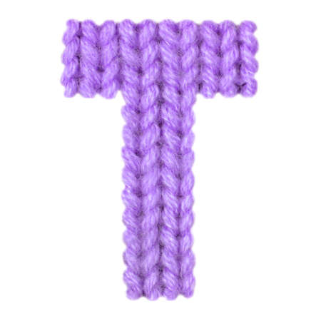 Letter T alphabet on a blurry texture knitted pattern of woolen thread closeup. One letter of the English alphabet. Education and holidays. Typography design. Color purpleの写真素材