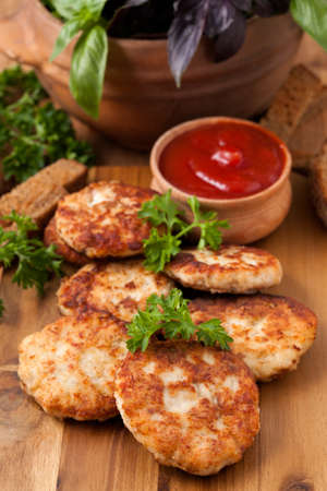 Cutlets on the wooden deskの写真素材